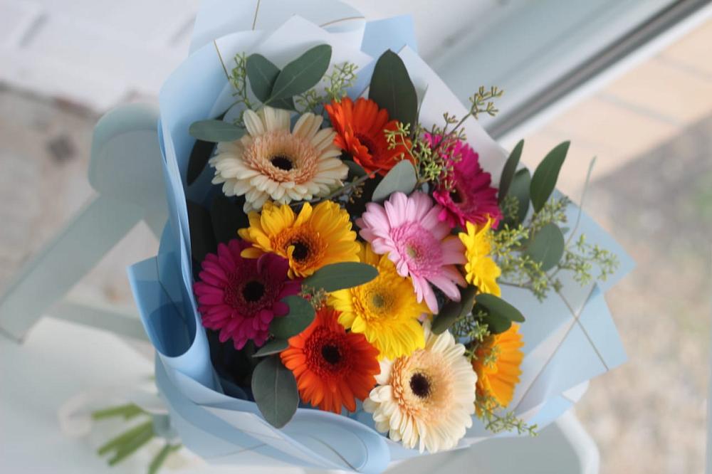 Букет цветов из: Герберы в Полурядинки